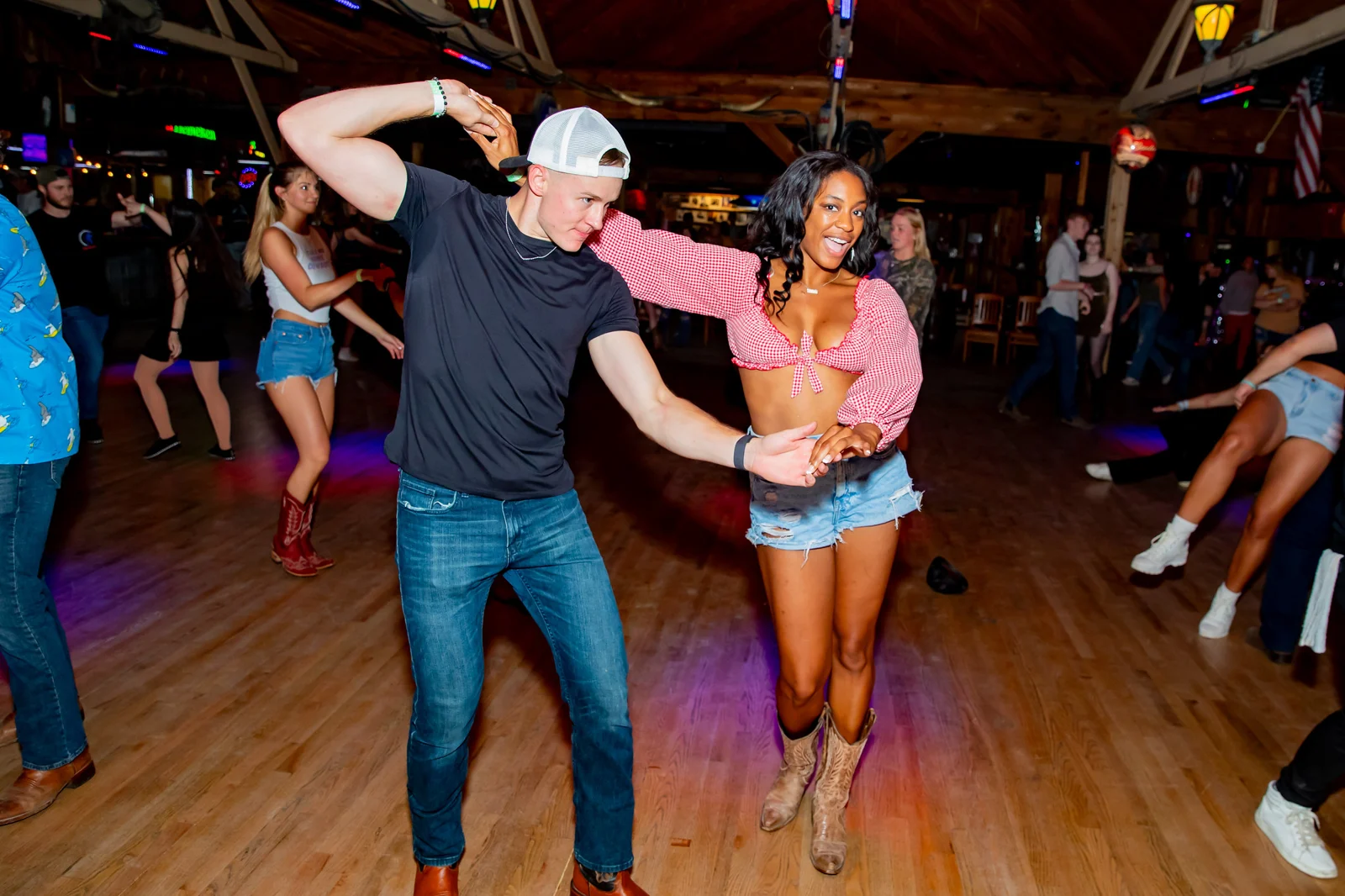A couple enjoying partner dancing at The Barn