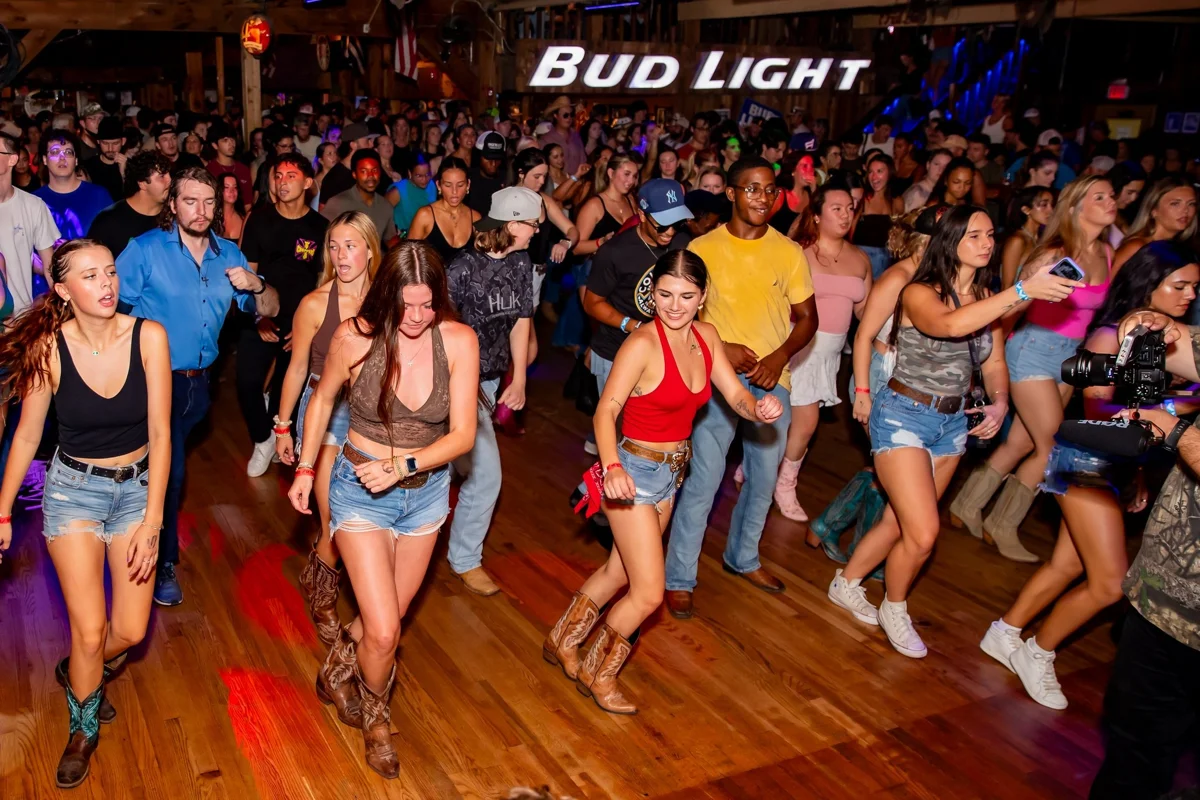 Football on the TVs, Dancing on the Floor · archive picture