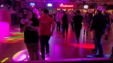 Line dancing · A full dance floor